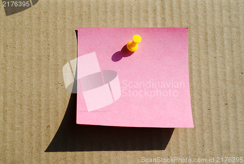 Image of red note paper with pin