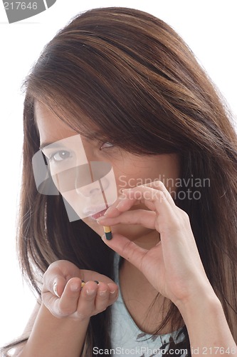 Image of Woman with vitamins