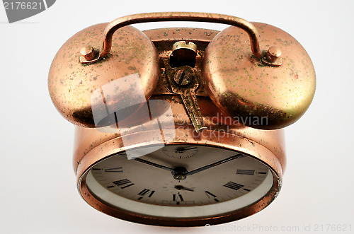 Image of vintage copper alarm clock  