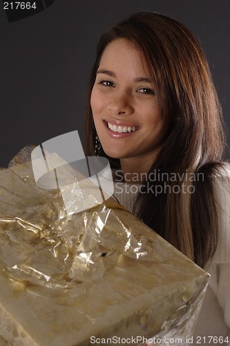 Image of Woman holding gift