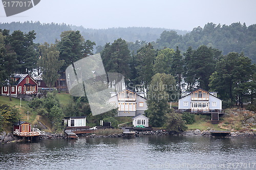 Image of home on the shore