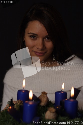 Image of Woman with candles