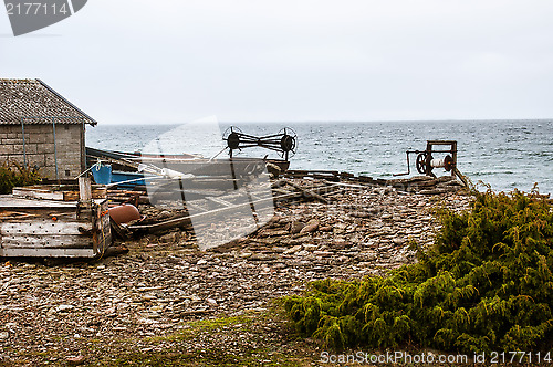 Image of Old tools on shore