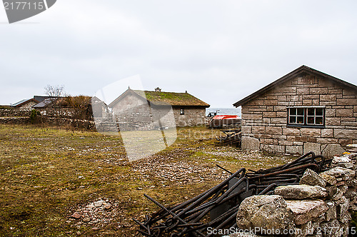 Image of Stonehouses on shore