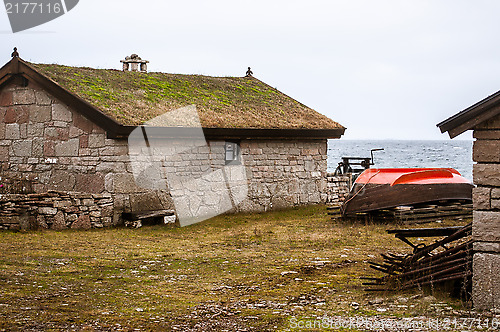 Image of Stone house on shore