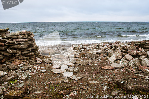 Image of Stone wall and shore