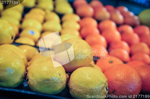 Image of lemon and oranges on produce shelf