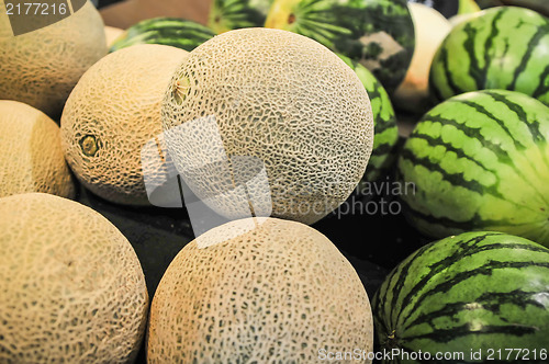 Image of melons on display shelf at the supremarket