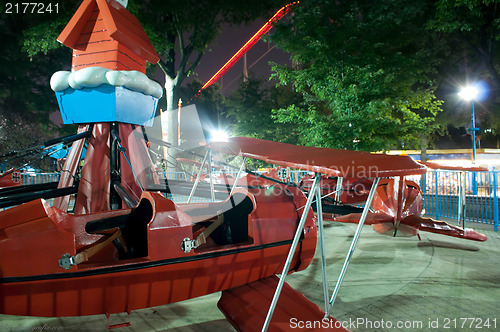 Image of at the amusement park at night