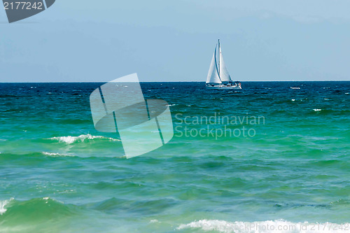 Image of sail boat on ocean