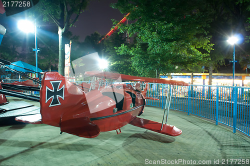 Image of at the amusement park at night