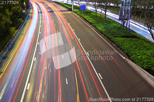 Image of light trails on highway