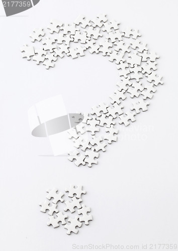 Image of question mark made by puzzle