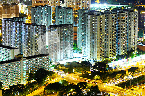 Image of apartment building at night