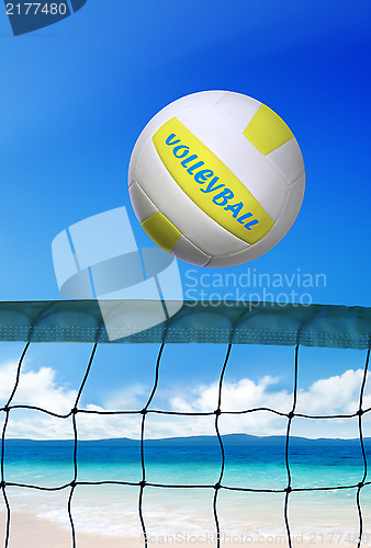 Image of volleyball on beach at sunny day