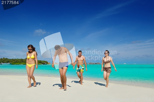 Image of group of happy young people have fun on bach