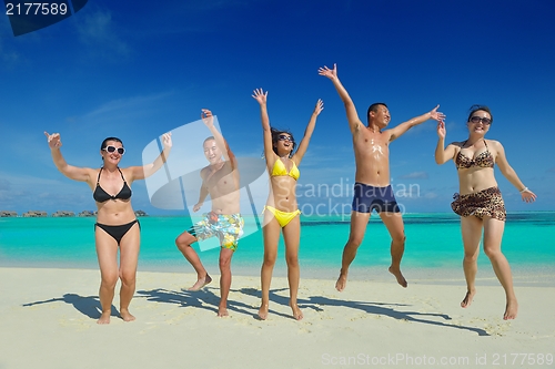Image of group of happy young people have fun on bach