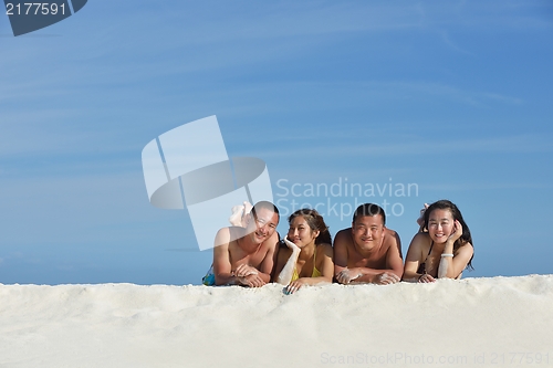 Image of group of happy young people have fun on bach