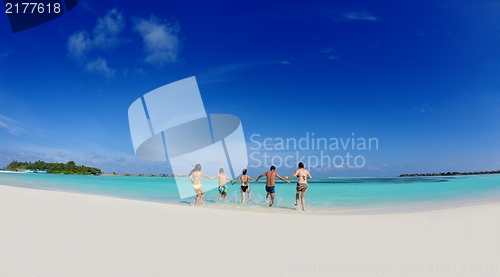 Image of group of happy young people have fun on bach