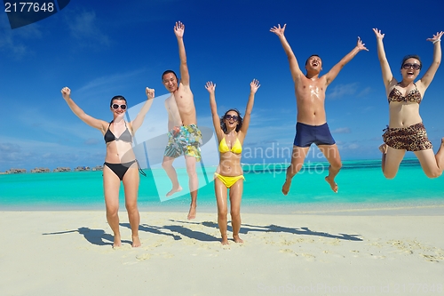 Image of group of happy young people have fun on bach