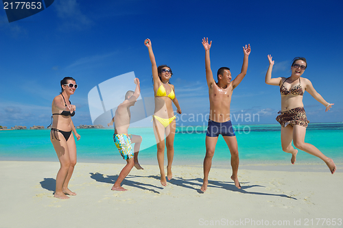 Image of group of happy young people have fun on bach