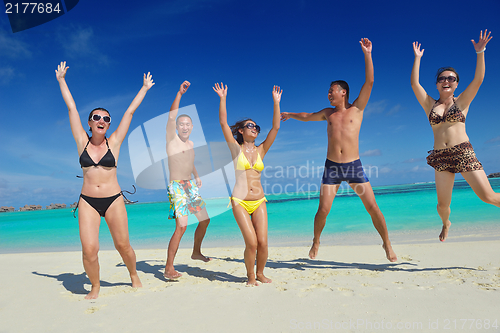 Image of group of happy young people have fun on bach