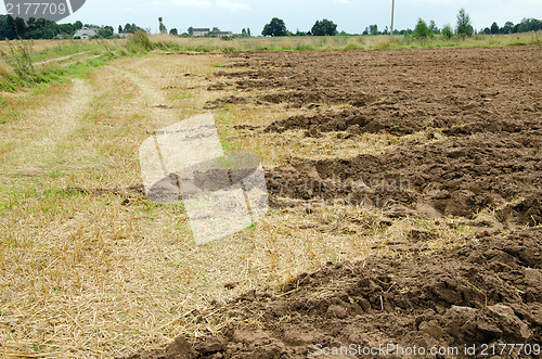 Image of agricultural part plowed field ground soil autumn 