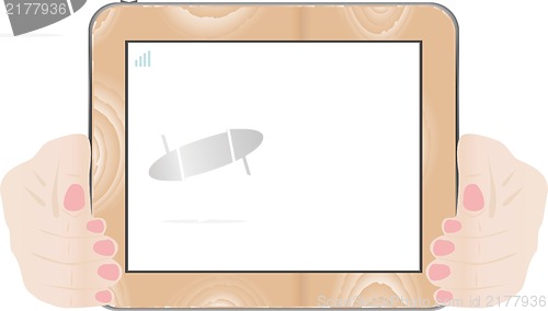 Image of Hands holding touch screen wooden tablet pc with blank screen