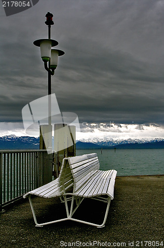 Image of  bench and autumn in river mera 