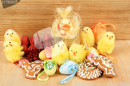 Image of easter decoration, gingerbread, chicken and painted eggs