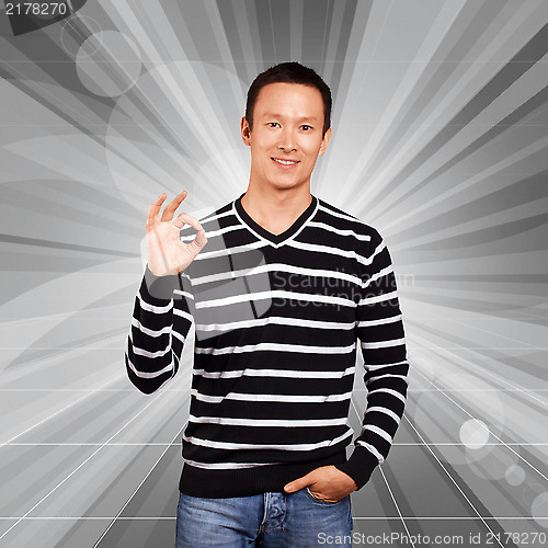 Image of Asian Man In Striped Pullover