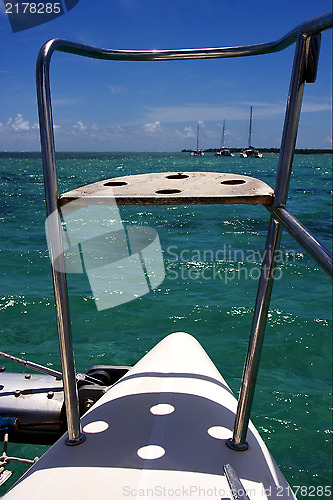 Image of  catamaran  boat  and coastline in Deer Island mauritius