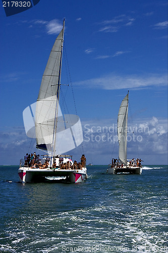 Image of  catamaran and coastline in mauritius