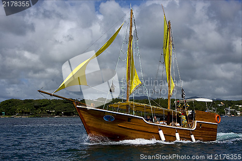 Image of tropical lagoon  pirate boat  and coastline 