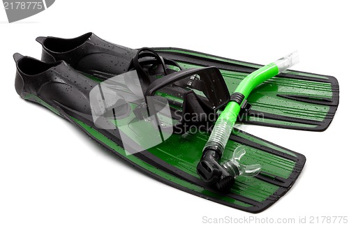 Image of Mask, snorkel and flippers with water drops. Diving gear on whit