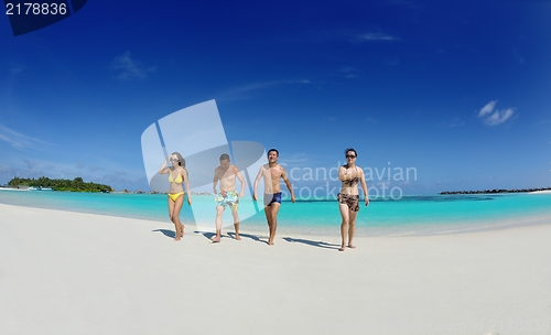 Image of group of happy young people have fun on bach