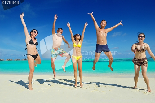 Image of group of happy young people have fun on bach