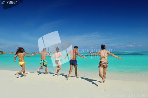 Image of group of happy young people have fun on bach