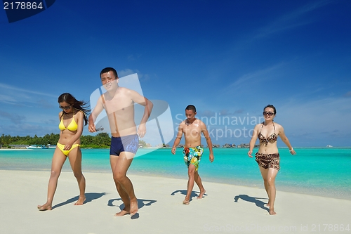 Image of group of happy young people have fun on bach