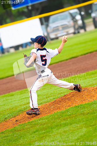 Image of Young baseball pitcher