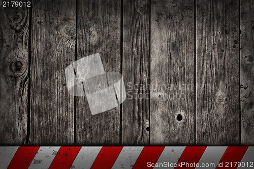 Image of wooden background with warning bar