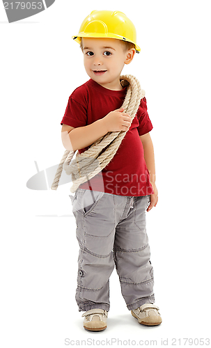 Image of Little handyman with rope, wearing protective helmet