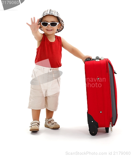 Image of Child in sunglasses, waving with hand