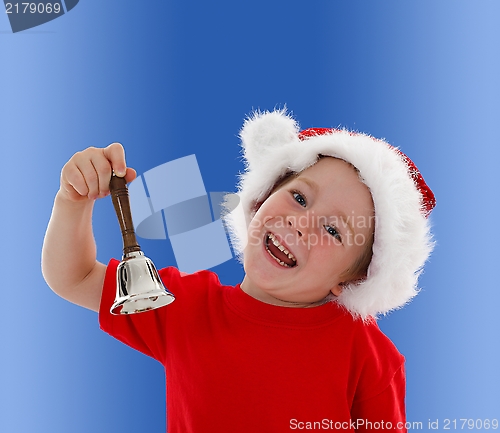 Image of Happy child ringing hand bell