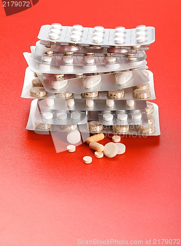 Image of Pills in front of stacked blister