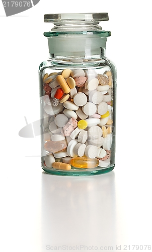 Image of Full chemistry bottle with colorful pills