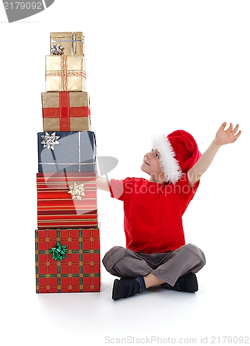 Image of Young child rejoicing over presents