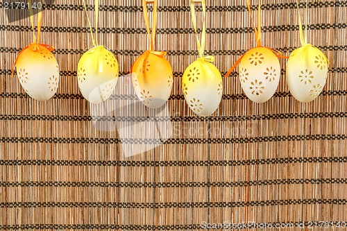 Image of Bright color easter eggs with bows