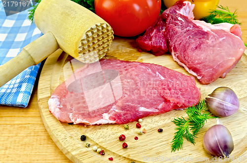 Image of Meat batted with a hammer and vegetables