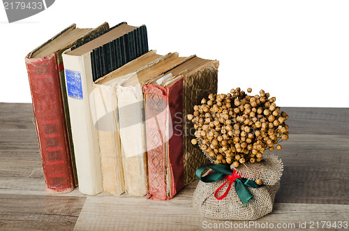 Image of pile of old books, isolated on white 